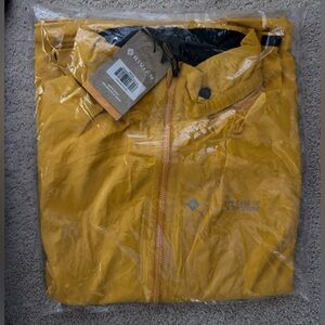 Rivian - Adventure Jacket. Unisex, size large. New w/ tags. Yellow.